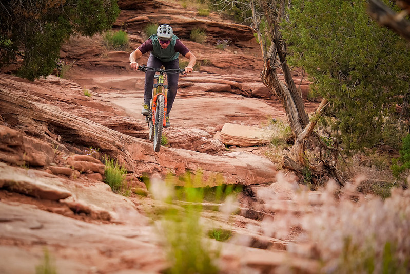 A man rides a mountain bike at the Kokopelli trail.